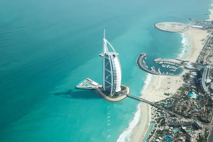 Framed Print : Dubai, UAE - May 18, 2018: Aerial view of Burj Al Arab luxury hotel on the coast of Persian Gulf on a clear sunny day Framed Print : Dubai, UAE - May 18, 2018: Aerial view of Burj Al Arab luxury hotel on the coast of Persian Gulf on a clear sunny day