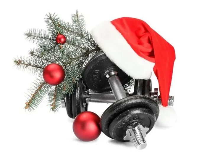 Framed Print : Dumbbells and Christmas decor isolated on white Framed Print : Dumbbells and Christmas decor isolated on white