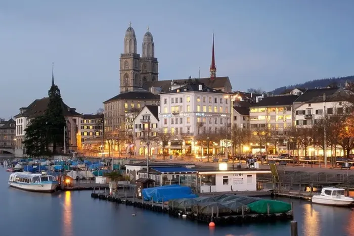Framed Print : Dusk view of Grossmünster church and part of the Limmat River and old town of Zürich Switzerland Framed Print : Dusk view of Grossmünster church and part of the Limmat River and old town of Zürich Switzerland