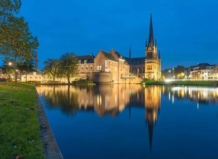 Framed Print : Dutch city of Woerden, view of the St. Bonaventura church and castle of Woerden during blue hour Framed Print : Dutch city of Woerden, view of the St. Bonaventura church and castle of Woerden during blue hour