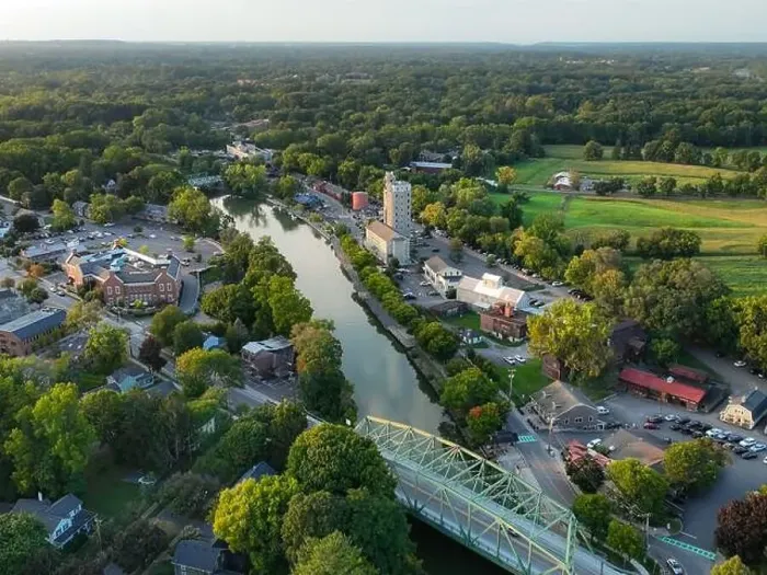 Framed Print : Early evening aerial photo of Schoen Place and the Erie Canal in the Village of Pittsford, New York Framed Print : Early evening aerial photo of Schoen Place and the Erie Canal in the Village of Pittsford, New York