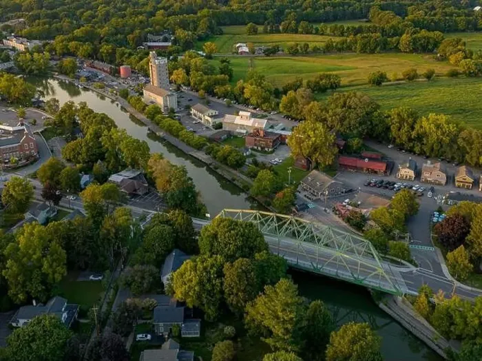 Framed Print : Early evening aerial photo of Schoen Place and the Erie Canal in the Village of Pittsford, New York Framed Print : Early evening aerial photo of Schoen Place and the Erie Canal in the Village of Pittsford, New York