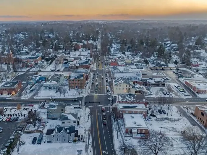 Framed Print : Early evening winter aerial photo of the four corners in the Village of Pittsford, New York. (01-14-2024) Framed Print : Early evening winter aerial photo of the four corners in the Village of Pittsford, New York. (01-14-2024)
