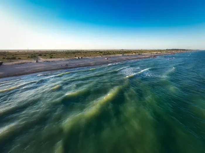 Framed Print : The edge of the sea in the evening sun. Camping beach. Drone shot 4K Framed Print : The edge of the sea in the evening sun. Camping beach. Drone shot 4K