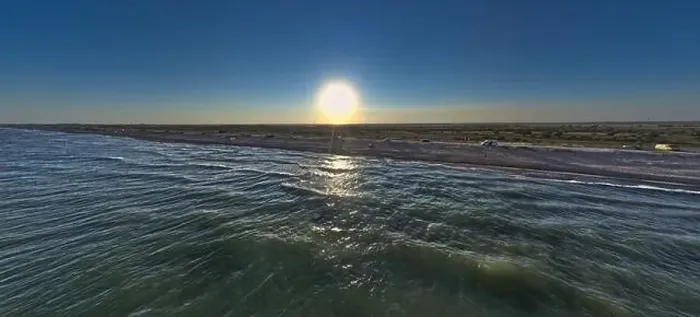 Framed Print : The edge of the sea in the evening sun. Camping beach. Drone shot 4K Framed Print : The edge of the sea in the evening sun. Camping beach. Drone shot 4K