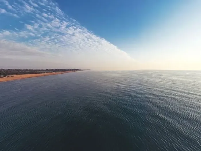 Framed Print : The edge of the sea in the evening sun. Camping beach. Drone shot 4K Framed Print : The edge of the sea in the evening sun. Camping beach. Drone shot 4K