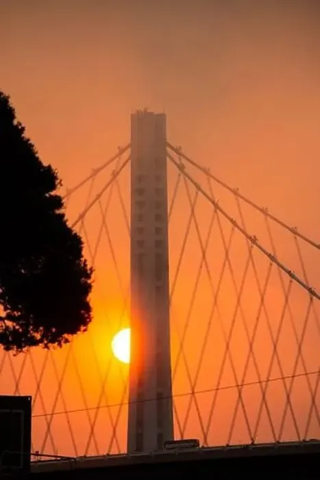 Framed Print : Eerie orange sky over Bay Bridge in San Francisco, zoom in vertical image Framed Print : Eerie orange sky over Bay Bridge in San Francisco, zoom in vertical image