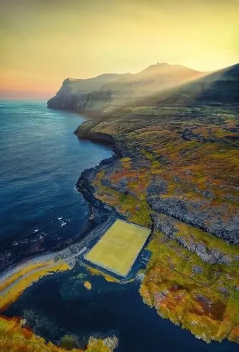 Framed Print : Eidi Soccer Field by the Ocean on the Faroe Islands, post processed in HDR Framed Print : Eidi Soccer Field by the Ocean on the Faroe Islands, post processed in HDR