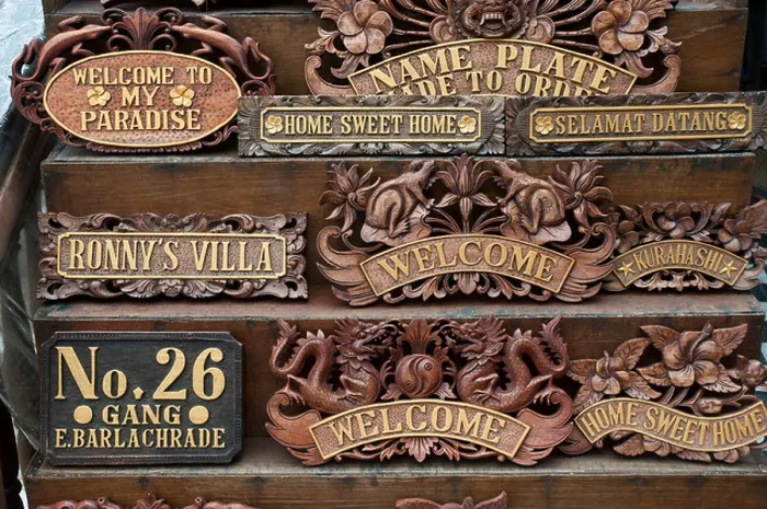 Framed Print : Elaborately carved wooden signs made to order in Bali Indonesia Framed Print : Elaborately carved wooden signs made to order in Bali Indonesia