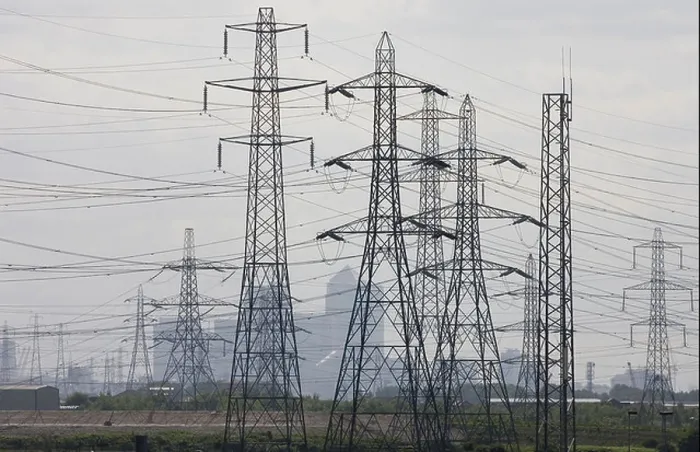 Framed Print : Electricity Pylons part of the National Grid stretch out across Essex U K Framed Print : Electricity Pylons part of the National Grid stretch out across Essex U K