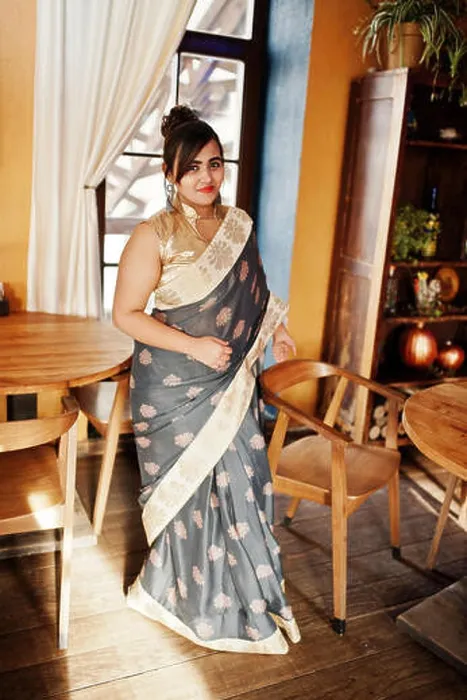 Framed Print : Elegant brunette south asian indian girl in saree posed indoor cafe Framed Print : Elegant brunette south asian indian girl in saree posed indoor cafe