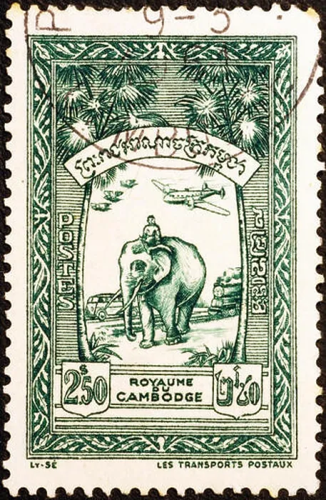 Framed Print : Elephant at work on vintage cambodian postage stamp Framed Print : Elephant at work on vintage cambodian postage stamp