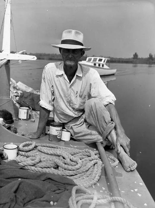 Framed Print : Elisha Pappy Turner is seen fishing with a seine net in Naples Framed Print : Elisha Pappy Turner is seen fishing with a seine net in Naples