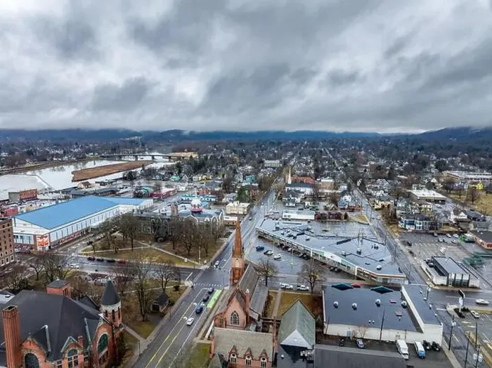 Framed Print : Elmira, NY, USA - 03-02-2024 - Cloudy winter aerial image of the downtown area in the City of Elmira