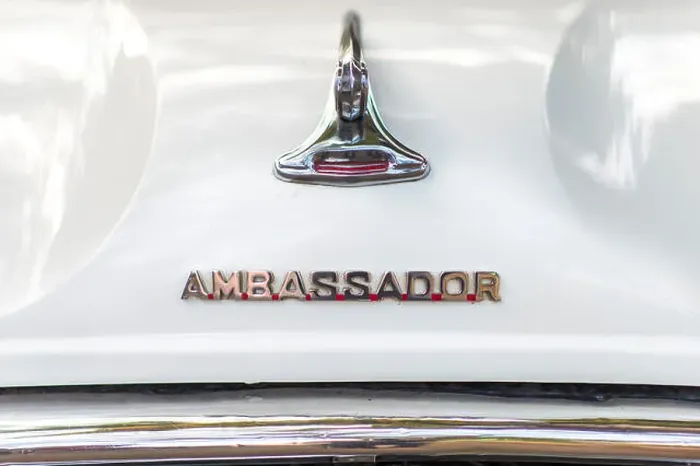 Framed Print : Emblem on a white Ambassador, Fort Cochin, Kochi, Kerala, India Framed Print : Emblem on a white Ambassador, Fort Cochin, Kochi, Kerala, India