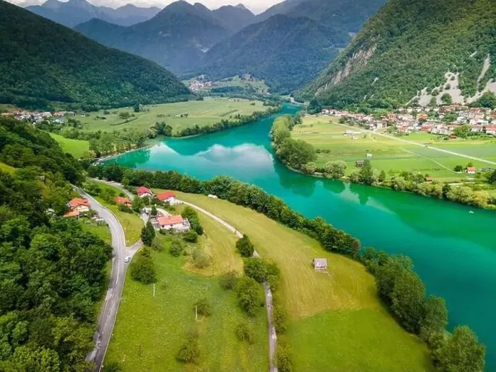 Framed Print : Emerald Green Watersin Soca River and Mountains in Tolmin Slovenia
