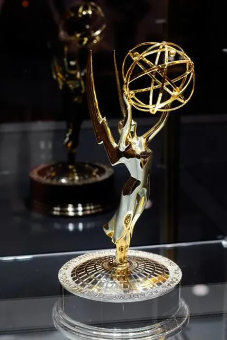Framed Print : An Emmy award statuette in a display case. National Academy of Television Arts and Sciences trophy Framed Print : An Emmy award statuette in a display case. National Academy of Television Arts and Sciences trophy