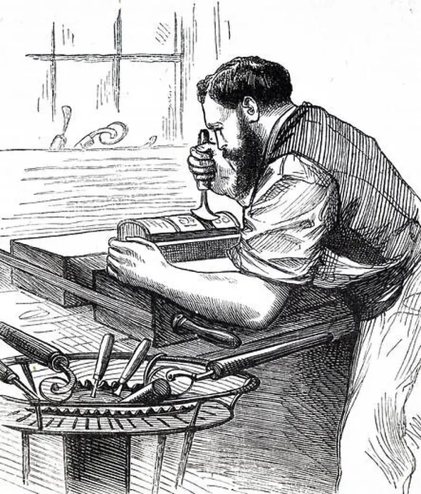 Framed Print : Engraving depicting a process in bookbinding: decorating the spine of a leather-bound book. Dated 19th century Framed Print : Engraving depicting a process in bookbinding: decorating the spine of a leather-bound book. Dated 19th century