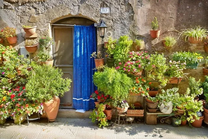 Framed Print : Entrance decorated with flowers, Pitigliano, Tuscany, Italy Framed Print : Entrance decorated with flowers, Pitigliano, Tuscany, Italy