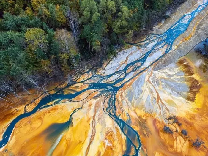 Framed Print : The environmental issue creating abstract patterns from the toxic waste of the copper and gold mining Framed Print : The environmental issue creating abstract patterns from the toxic waste of the copper and gold mining