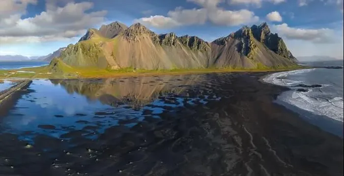 Framed Print : Epic aerial drone view flying over landscape of the black sand beach in Stokksnes on a sunny day Framed Print : Epic aerial drone view flying over landscape of the black sand beach in Stokksnes on a sunny day