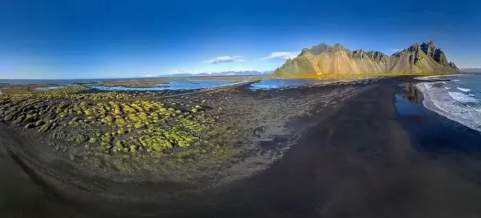 Framed Print : Epic aerial drone view flying over landscape of the black sand beach in Stokksnes on a sunny day Framed Print : Epic aerial drone view flying over landscape of the black sand beach in Stokksnes on a sunny day