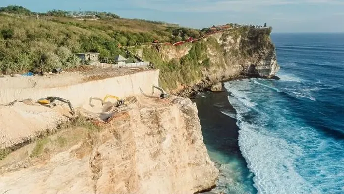 Framed Print : Escalators working and the destroying of the cliff in Uluwatu, Bali. Aerial view Framed Print : Escalators working and the destroying of the cliff in Uluwatu, Bali. Aerial view