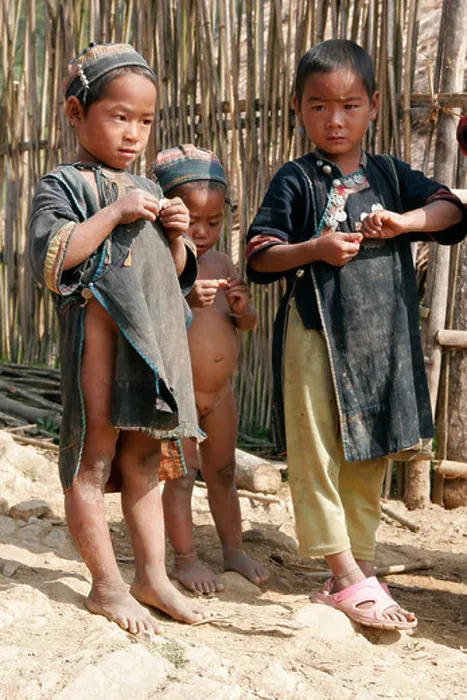 Framed Print : Ethnic Akha children wearing traditional clothes in tribal village near Phongsali, Laos Framed Print : Ethnic Akha children wearing traditional clothes in tribal village near Phongsali, Laos