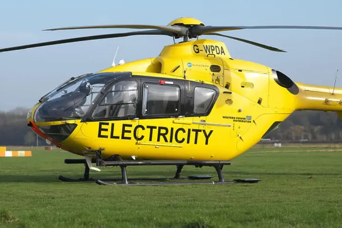 Framed Print : Eurocopter EC 135 helicopter used for electricity power supply checking by Western Power Distribution WPD in UK Framed Print : Eurocopter EC 135 helicopter used for electricity power supply checking by Western Power Distribution WPD in UK