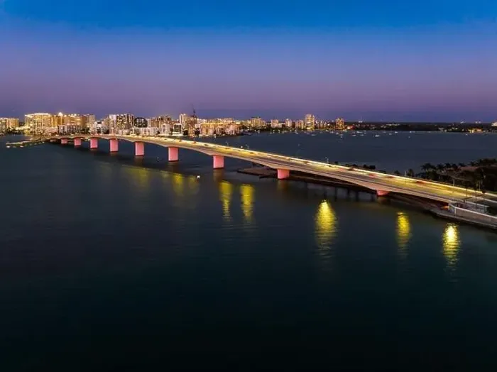 Framed Print : Evening aerial image of the Sarasota, Florida Skyline and Bridge Across Sarasota Bay Framed Print : Evening aerial image of the Sarasota, Florida Skyline and Bridge Across Sarasota Bay