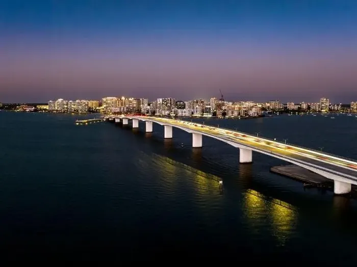 Framed Print : Evening aerial image of the Sarasota, Florida Skyline and Bridge Across Sarasota Bay Framed Print : Evening aerial image of the Sarasota, Florida Skyline and Bridge Across Sarasota Bay