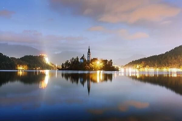 Evening autumn view of Bled lake in Julian Alps, Slovenia. Pilgrimage church of the Assumption of Maria on a foreground. Landscape photography