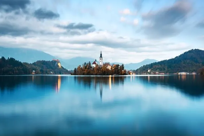 Framed Print : Evening autumn view of Bled lake in Julian Alps, Slovenia. Pilgrimage church of the Assumption of Maria on a foreground. Landscape photography Framed Print : Evening autumn view of Bled lake in Julian Alps, Slovenia. Pilgrimage church of the Assumption of Maria on a foreground. Landscape photography