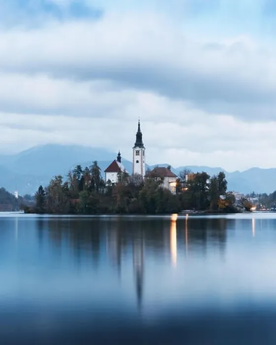 Framed Print : Evening autumn view of Bled lake in Julian Alps, Slovenia. Pilgrimage church of the Assumption of Maria on a foreground. Landscape photography Framed Print : Evening autumn view of Bled lake in Julian Alps, Slovenia. Pilgrimage church of the Assumption of Maria on a foreground. Landscape photography