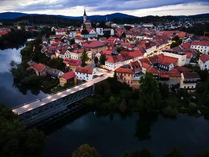 Framed Print : Evening Cityscape of Novo Mesto in Lover Carniola Region in Slovenia at River Krka Bend. Drone View Framed Print : Evening Cityscape of Novo Mesto in Lover Carniola Region in Slovenia at River Krka Bend. Drone View
