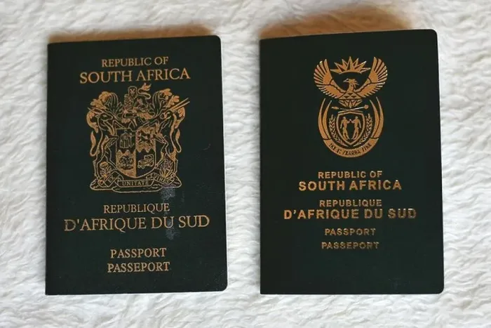 Framed Print : An example of an old South African passport next to a new South African passport Framed Print : An example of an old South African passport next to a new South African passport