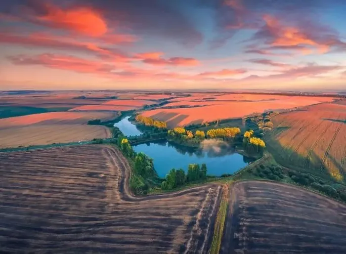 Framed Print : Exciting summer sunrise on Ternopil outskirts with two lakes and asphalt road on the midle Framed Print : Exciting summer sunrise on Ternopil outskirts with two lakes and asphalt road on the midle