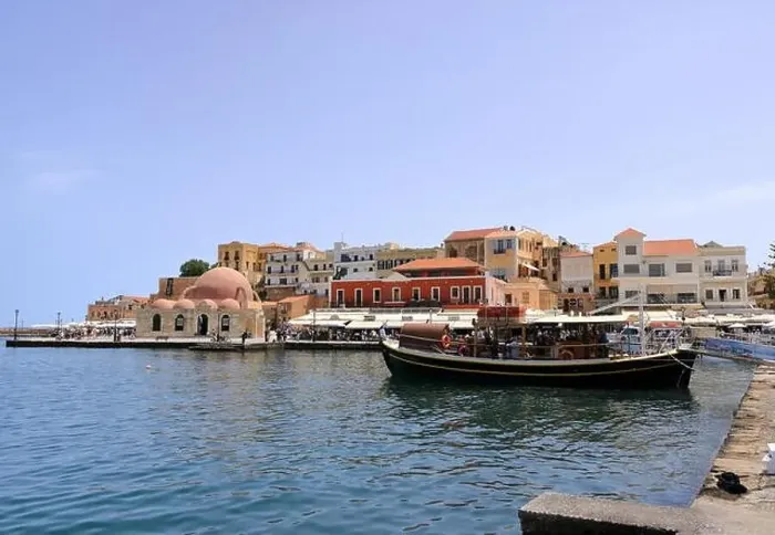 Framed Print : Excursion boat cruising Venetian harbour and mediterranean sea of Chania, Crete, Greece Framed Print : Excursion boat cruising Venetian harbour and mediterranean sea of Chania, Crete, Greece