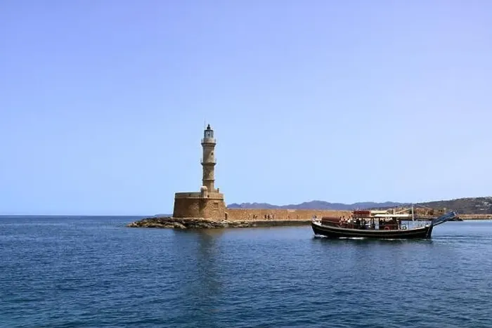 Framed Print : Excursion boat cruising Venetian harbour and mediterranean sea of Chania, Crete, Greece Framed Print : Excursion boat cruising Venetian harbour and mediterranean sea of Chania, Crete, Greece