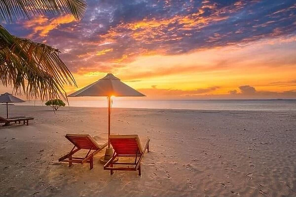 Exotic beach. Chairs on the sandy beach sea shore. Summer holiday and vacation concept for tourism. Inspirational tropical landscape. Tranquil romance