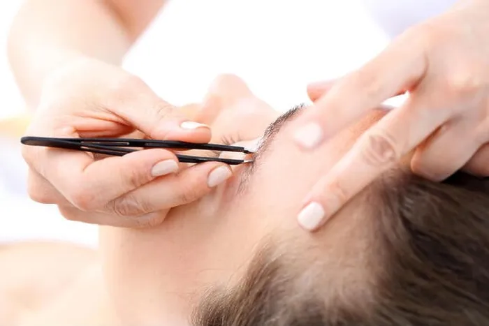 Framed Print : eyebrow tweezers. hair removal Framed Print : eyebrow tweezers. hair removal