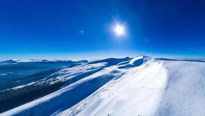 Framed Print : Fabulous view of the sunny winter slope with snowy trees located in the ski resort Framed Print : Fabulous view of the sunny winter slope with snowy trees located in the ski resort