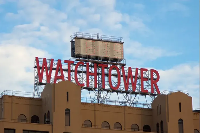 Framed Print : Facade with sign of The Watchtower building in the Dumbo area of Brooklyn, NY, USA on September 8, 2013 Framed Print : Facade with sign of The Watchtower building in the Dumbo area of Brooklyn, NY, USA on September 8, 2013
