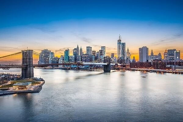 Famous view of New York City over the East River towards the financial district in the borough of Manhattan