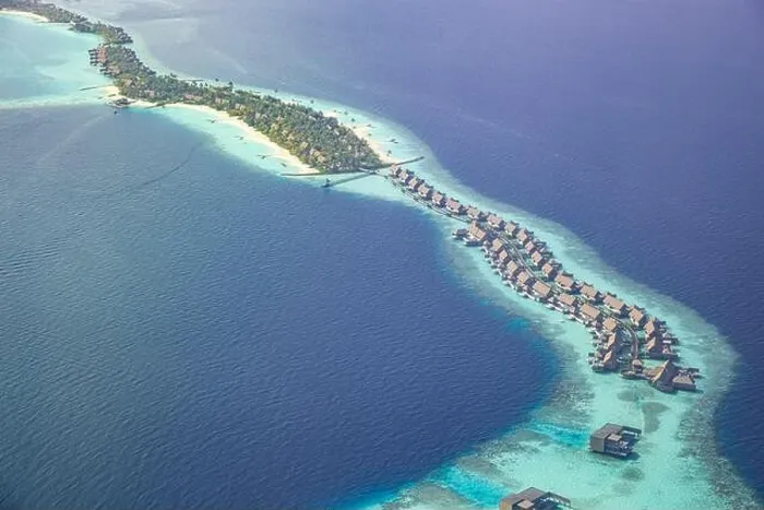 Framed Print : Fantastic aerial landscape, luxury tropical resort or hotel with water villas and beautiful beach scenic. Amazing bird eyes view in Maldives landscape