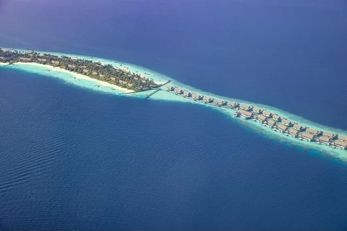 Framed Print : Fantastic aerial landscape, luxury tropical resort or hotel with water villas and beautiful beach scenic. Amazing bird eyes view in Maldives landscape Framed Print : Fantastic aerial landscape, luxury tropical resort or hotel with water villas and beautiful beach scenic. Amazing bird eyes view in Maldives landscape