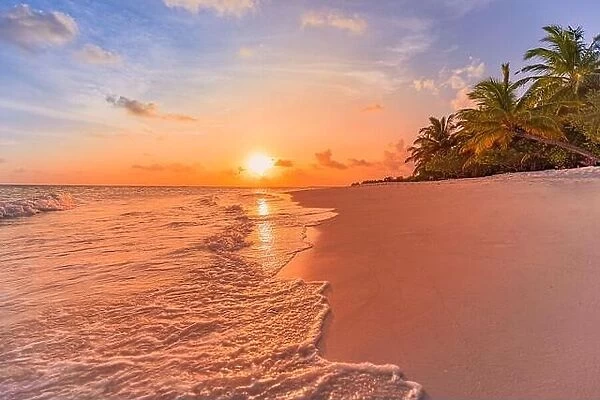 Fantastic closeup view of calm sea water waves orange sunrise sunset sunlight. Tropical island beach landscape, exotic shore coast. Summer vacation