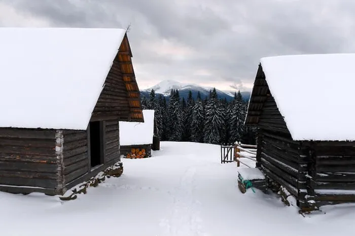Framed Print : Fantastic landscape with snowy mountains, trees and house. Carpathians, Ukraine, Europe Framed Print : Fantastic landscape with snowy mountains, trees and house. Carpathians, Ukraine, Europe