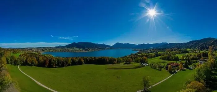 Framed Print : Fantastic panoramic view over the bavarian lake Tegernsee in autumn with fall colors, made by a drone at a sunny day Framed Print : Fantastic panoramic view over the bavarian lake Tegernsee in autumn with fall colors, made by a drone at a sunny day