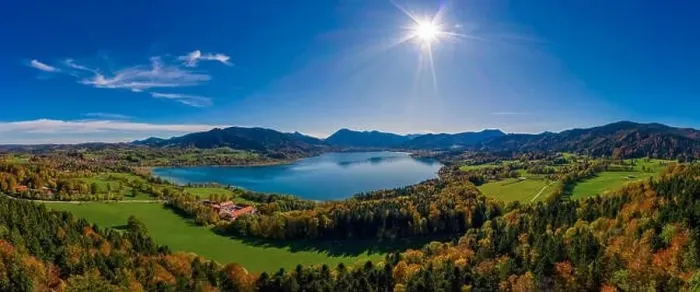 Framed Print : Fantastic panoramic view over the bavarian lake Tegernsee in autumn with fall colors, made by a drone Framed Print : Fantastic panoramic view over the bavarian lake Tegernsee in autumn with fall colors, made by a drone